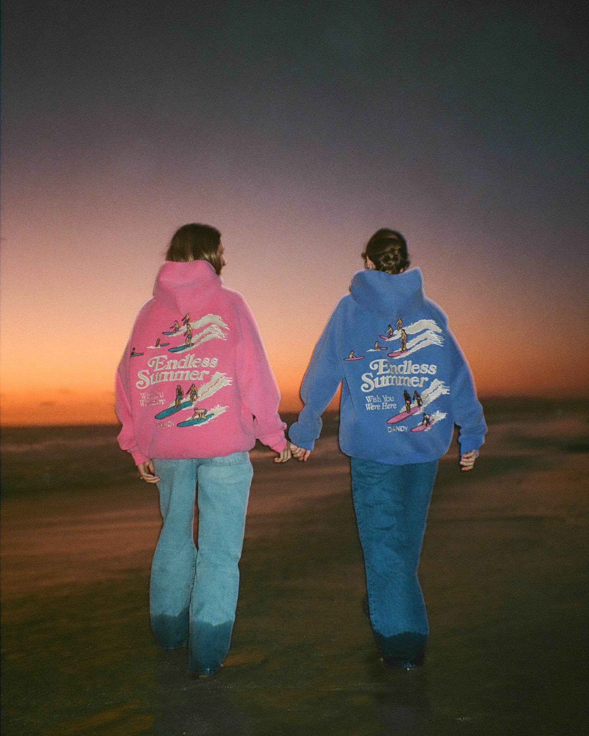 "Endless Summer" Oversized Lux Hoodie in Vintage Washed Blue standing next to the pink version of this hoodie