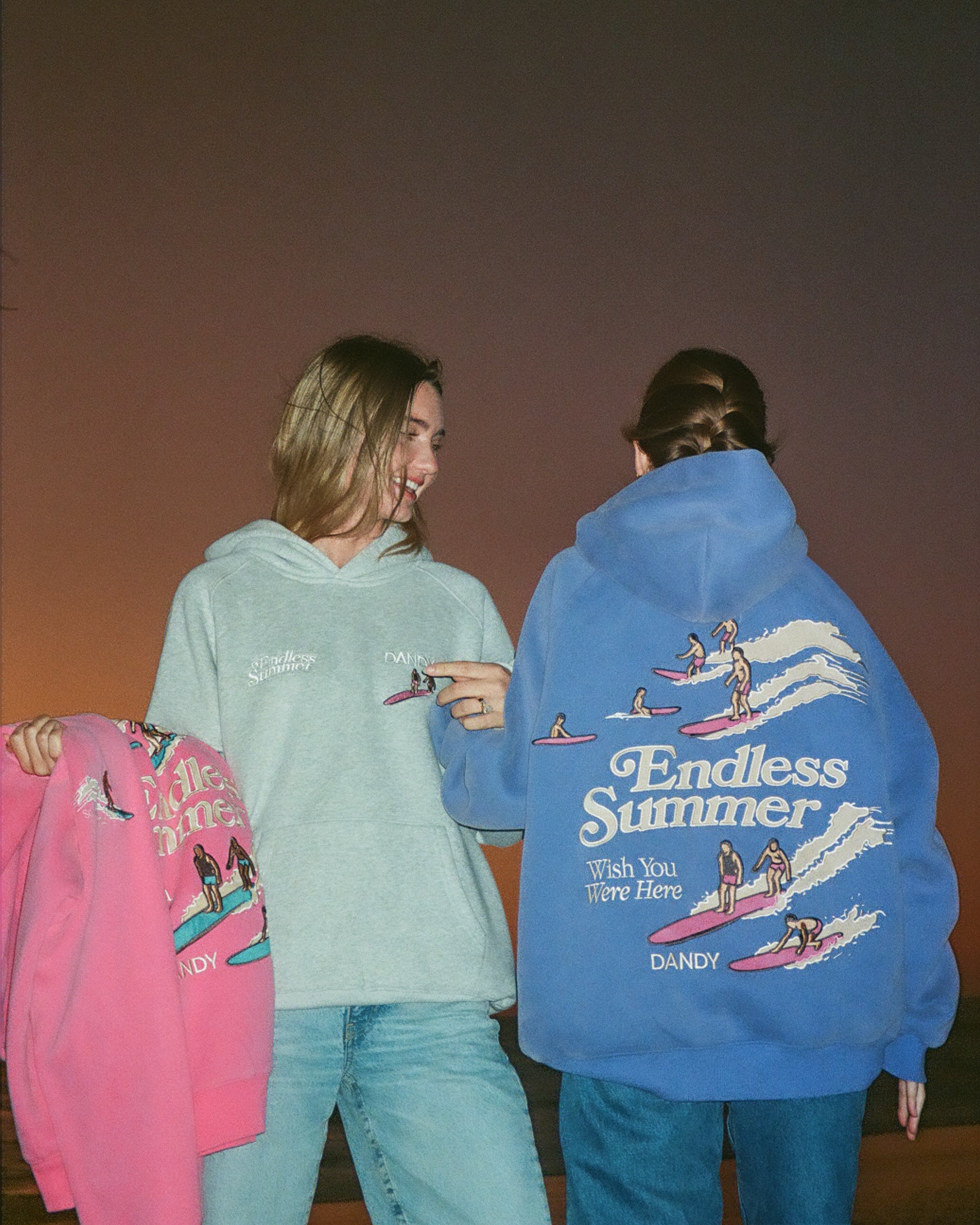 "Endless Summer" Oversized Lux Hoodie in Vintage Washed Blue standing next to the gray version of the hoodie